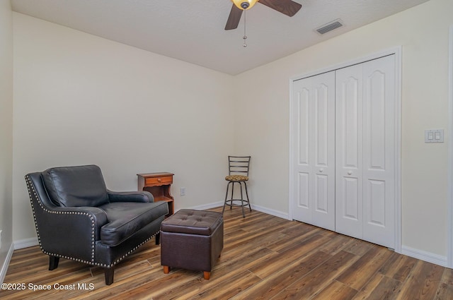 690 Grant Rd, Palm Bay, FL 32909 - sitting room with wood finished floors and ceiling fan