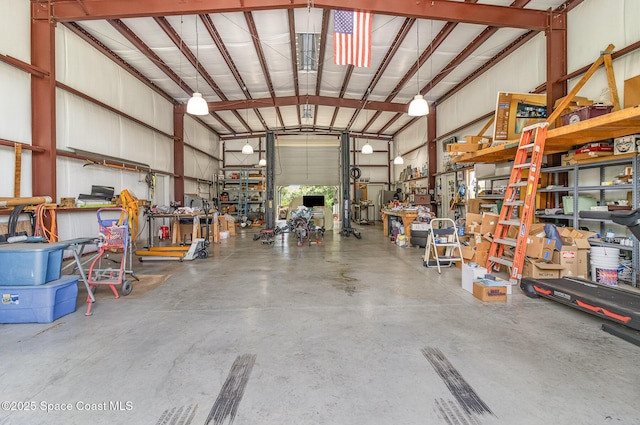 690 Grant Rd, Palm Bay, FL 32909 - garage with a workshop area