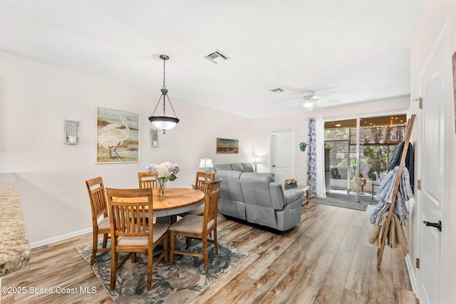 3498 Cutty Sark Way, Indialantic, FL 32903 - dining room featuring a ceiling fan and light wood-style flooring