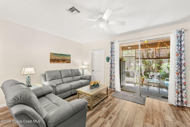 3498 Cutty Sark Way, Indialantic, FL 32903 - living area with wood finished floors and a ceiling fan