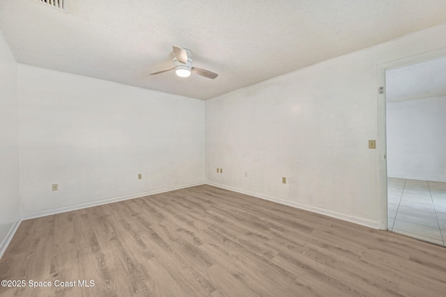 1327 Canterbury Ln, Rockledge, FL 32955 - spare room featuring a ceiling fan and wood finished floors