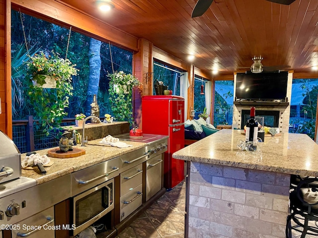 3601 Oneida St, Cocoa, FL 32926 - view of patio featuring exterior kitchen