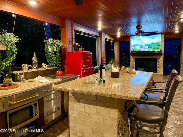 3601 Oneida St, Cocoa, FL 32926 - view of patio / terrace with an outdoor kitchen