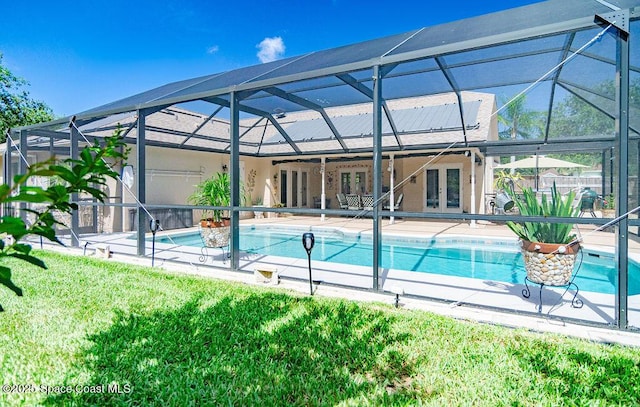 4204 Long Leaf Dr, Melbourne, FL 32940 - outdoor pool featuring french doors, a patio, a lanai, and a yard