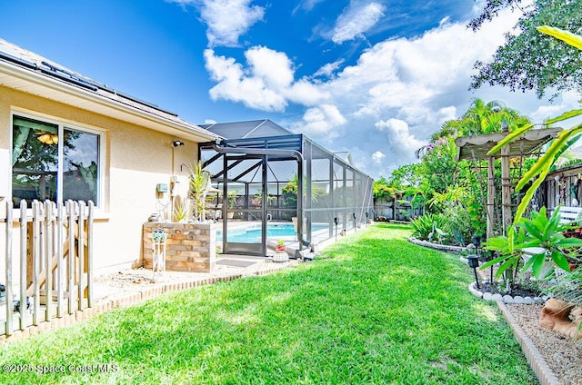 4204 Long Leaf Dr, Melbourne, FL 32940 - fenced backyard with an outdoor pool, a patio, and a lanai