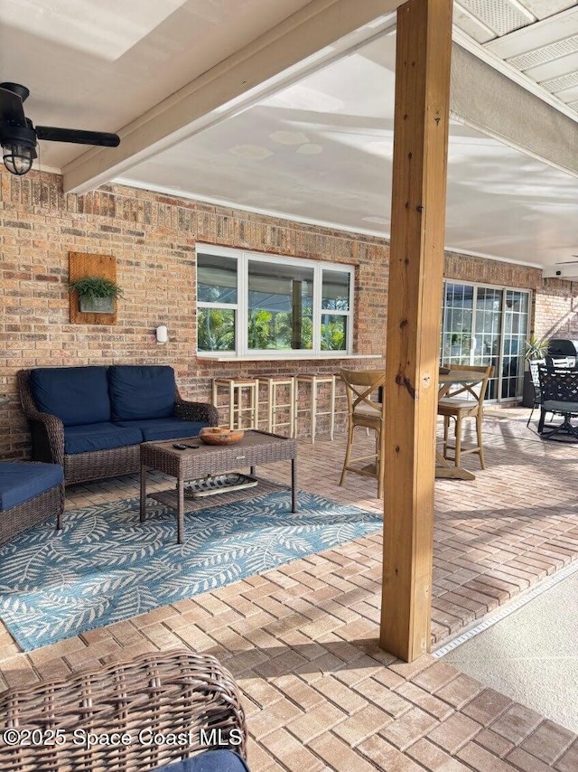 2940 Friday Ln, Cocoa, FL 32926 - view of patio with an outdoor living space, ceiling fan, and outdoor dining space