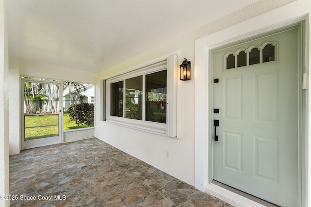 332 Nikomas Way, Melbourne Beach, FL 32951 - property entrance featuring a porch