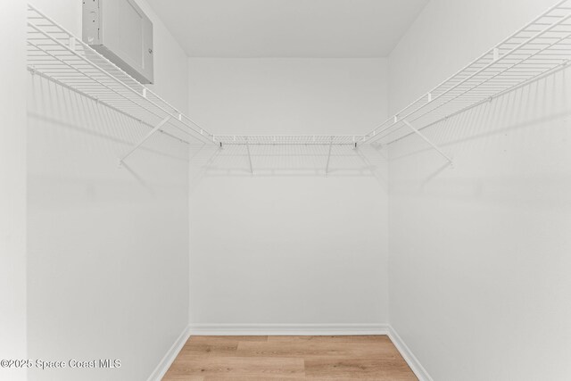 332 Nikomas Way, Melbourne Beach, FL 32951 - spacious closet featuring light wood-style flooring