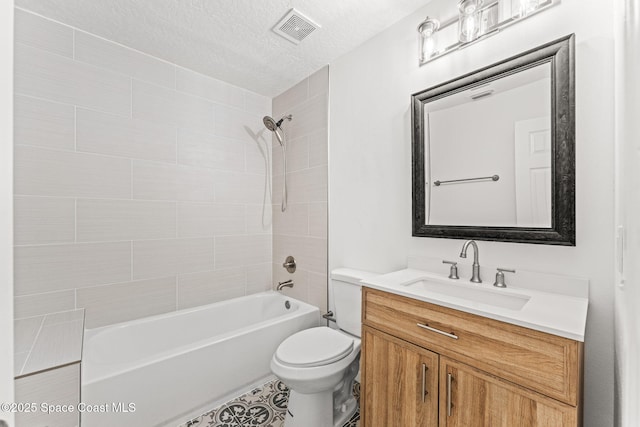 332 Nikomas Way, Melbourne Beach, FL 32951 - bathroom with vanity, shower / tub combination, a textured ceiling, and tile patterned flooring