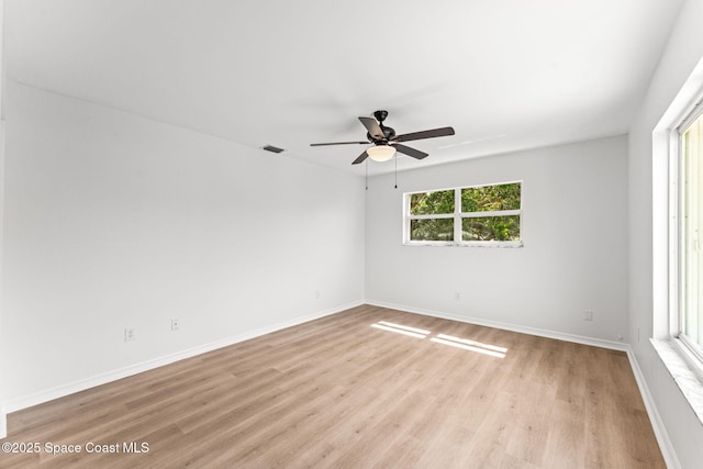 332 Nikomas Way, Melbourne Beach, FL 32951 - unfurnished room featuring light wood-style floors and a ceiling fan