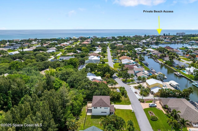332 Nikomas Way, Melbourne Beach, FL 32951 - aerial view of residential area featuring a large body of water