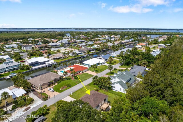 332 Nikomas Way, Melbourne Beach, FL 32951 - aerial perspective of suburban area featuring a nearby body of water