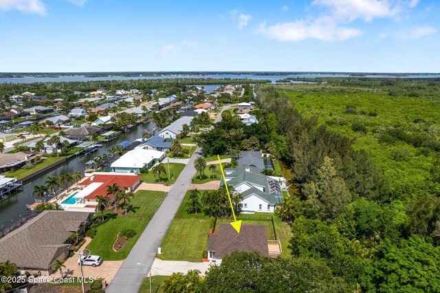 332 Nikomas Way, Melbourne Beach, FL 32951 - aerial view of residential area with a large body of water