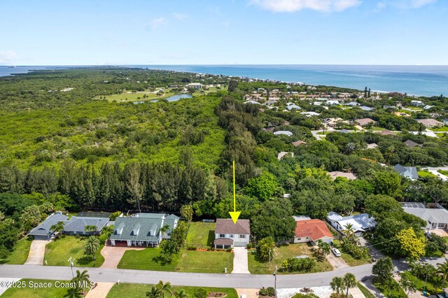 332 Nikomas Way, Melbourne Beach, FL 32951 - aerial perspective of suburban area featuring a nearby body of water