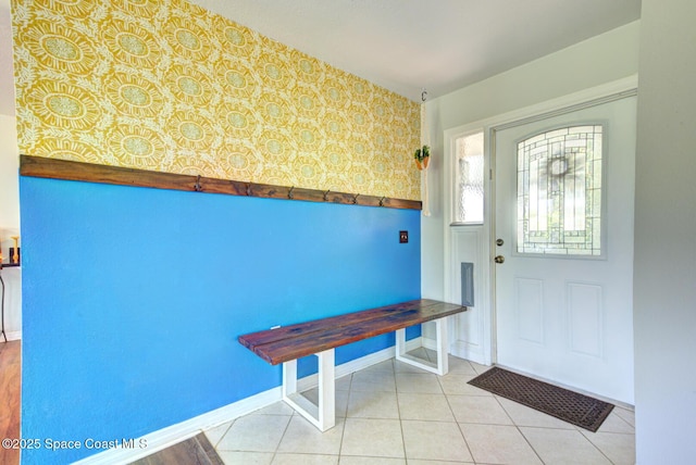 767 Adolph Ln, Cocoa, FL 32927 - foyer entrance with wallpapered walls and light tile patterned floors