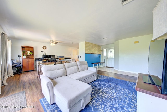 767 Adolph Ln, Cocoa, FL 32927 - living room featuring wood finished floors and a ceiling fan
