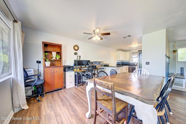 767 Adolph Ln, Cocoa, FL 32927 - dining room featuring a desk, light wood-type flooring, and ceiling fan
