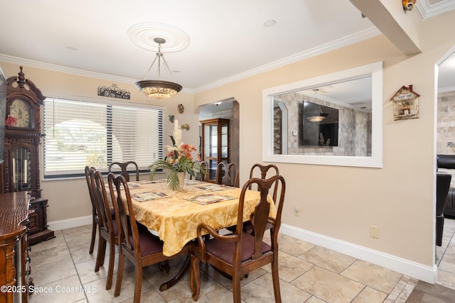 716 Endicott Rd, Melbourne, FL 32940 - dining room featuring ornamental molding and light tile patterned flooring