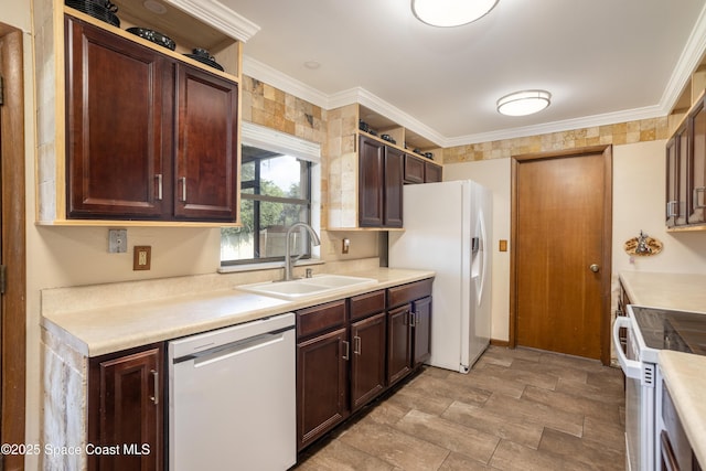 716 Endicott Rd, Melbourne, FL 32940 - kitchen featuring white appliances, light countertops, ornamental molding, and dark brown cabinetry