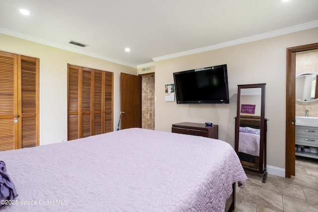 716 Endicott Rd, Melbourne, FL 32940 - bedroom featuring multiple closets, ornamental molding, recessed lighting, and ensuite bathroom