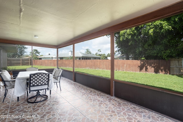 716 Endicott Rd, Melbourne, FL 32940 - sunroom with outdoor dining space