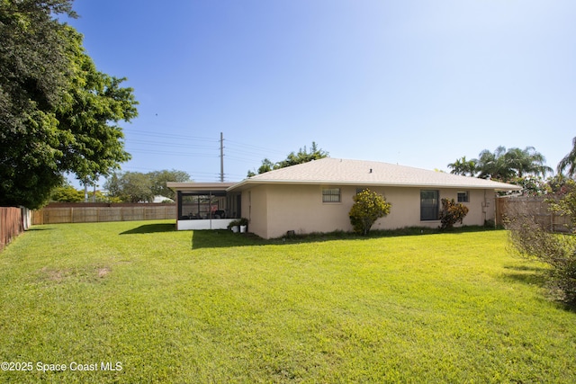 716 Endicott Rd, Melbourne, FL 32940 - fenced backyard featuring a sunroom