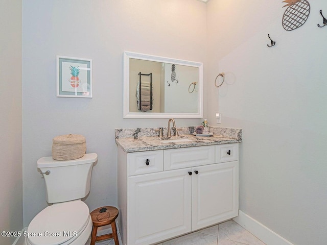 406 9th Ct, Vero Beach, FL 32962 - half bathroom featuring vanity and baseboards