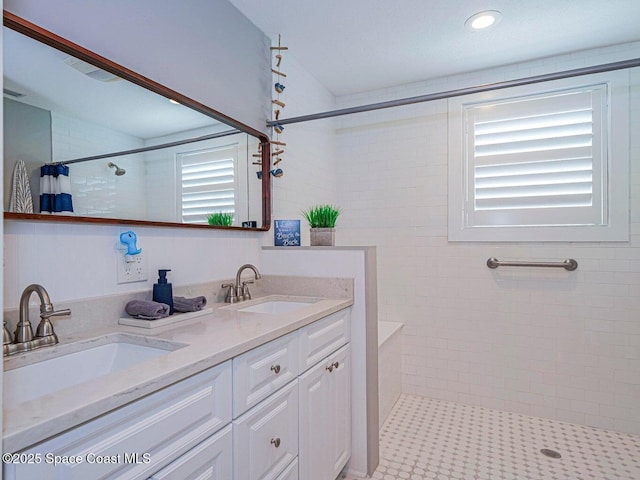 406 9th Ct, Vero Beach, FL 32962 - full bathroom with a tile shower and double vanity