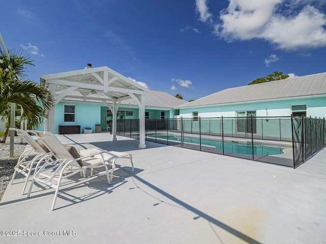 406 9th Ct, Vero Beach, FL 32962 - view of swimming pool with a patio