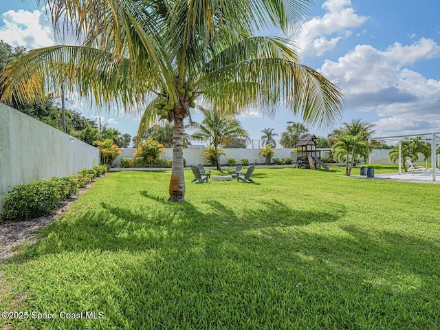 406 9th Ct, Vero Beach, FL 32962 - view of yard with a playground