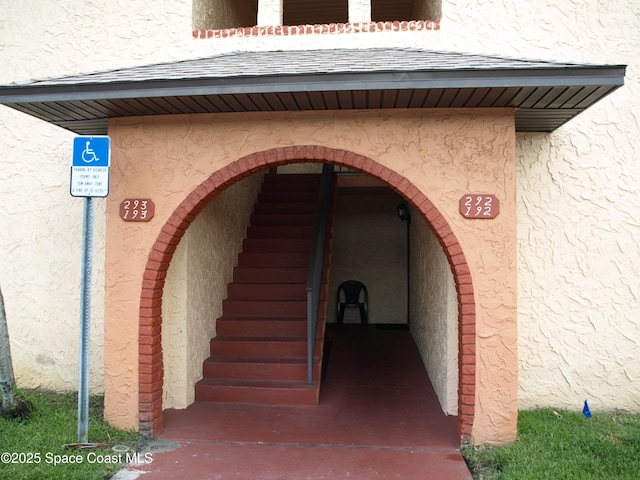 292 San Juan Cir, Melbourne, FL 32935 - property entrance with stucco siding