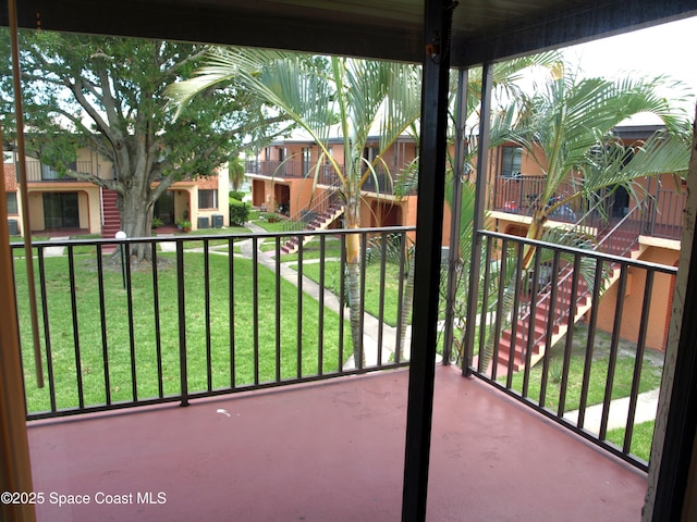 292 San Juan Cir, Melbourne, FL 32935 - balcony with stairway