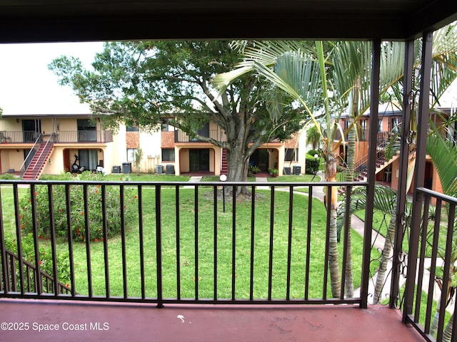 292 San Juan Cir, Melbourne, FL 32935 - balcony with stairway