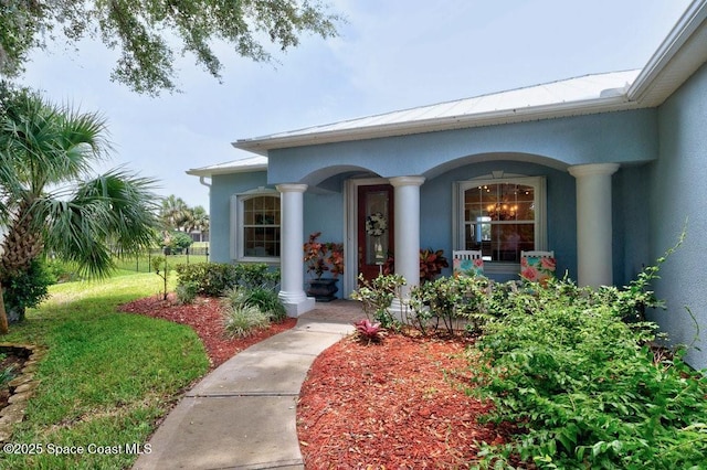 770 S Easy St, Sebastian, FL 32958 - doorway to property featuring stucco siding and a porch