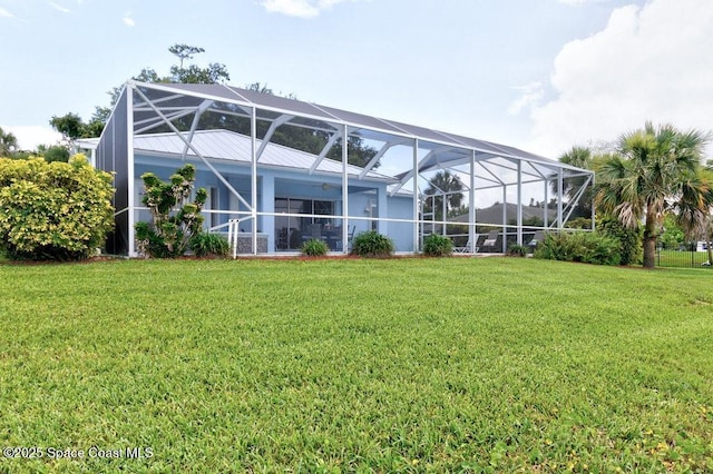 770 S Easy St, Sebastian, FL 32958 - rear view of property featuring a yard and a lanai