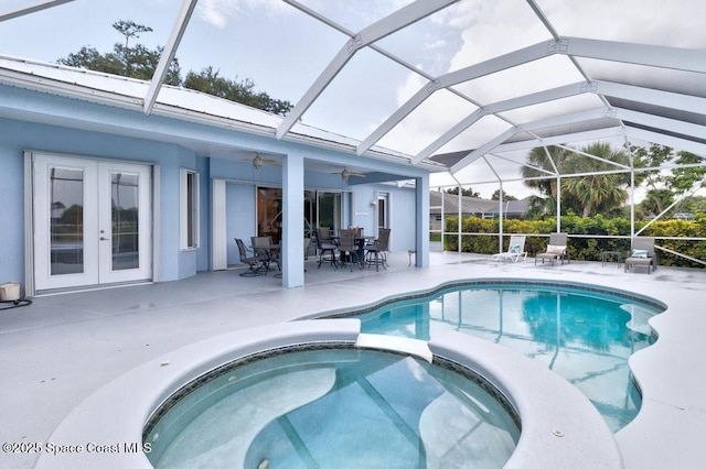 770 S Easy St, Sebastian, FL 32958 - view of pool with french doors, a pool with connected hot tub, a patio area, a ceiling fan, and glass enclosure