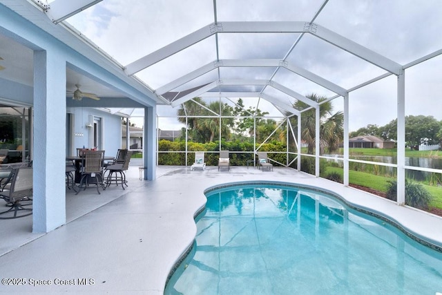 770 S Easy St, Sebastian, FL 32958 - outdoor pool featuring a patio area, a ceiling fan, and glass enclosure