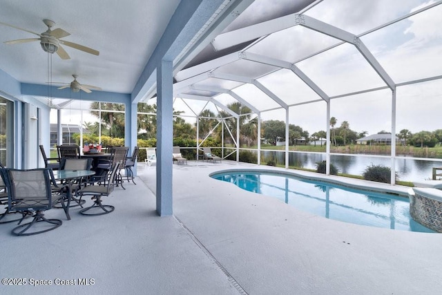 770 S Easy St, Sebastian, FL 32958 - swimming pool with ceiling fan, a patio, a water view, and glass enclosure