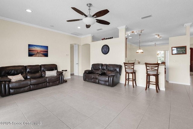 770 S Easy St, Sebastian, FL 32958 - tiled living area featuring ornamental molding, ceiling fan, recessed lighting, and arched walkways
