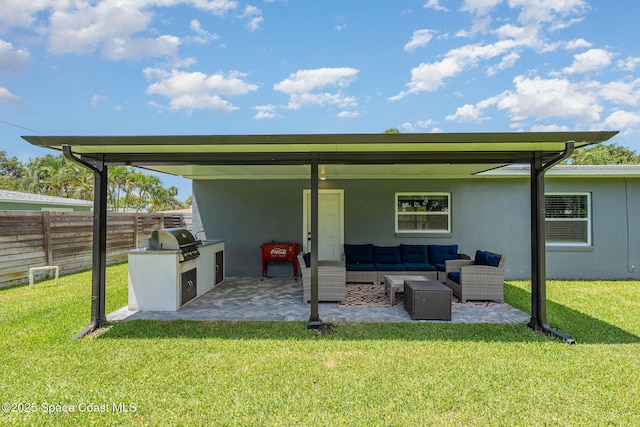 131 W Gadsden Ln, Cocoa Beach, FL 32931 - view of patio / terrace featuring area for grilling and an outdoor hangout area