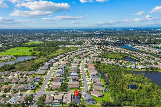1787 Attilburgh Blvd, West Melbourne, FL 32904 - aerial view of property and surrounding area featuring nearby suburban area and a nearby body of water