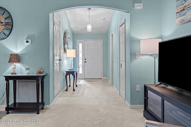 1787 Attilburgh Blvd, West Melbourne, FL 32904 - foyer entrance featuring arched walkways and carpet floors