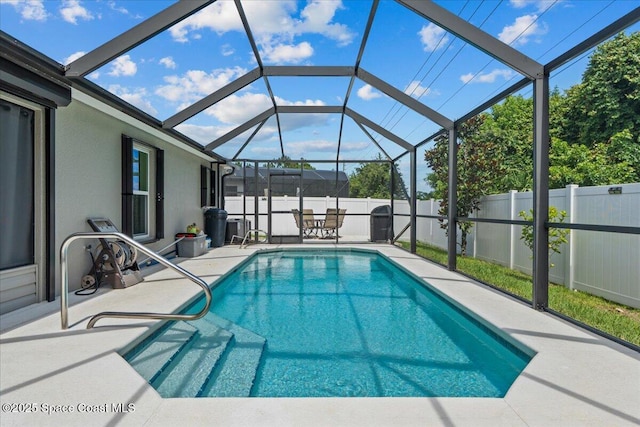 1787 Attilburgh Blvd, West Melbourne, FL 32904 - view of swimming pool with a patio, a fenced backyard, and glass enclosure