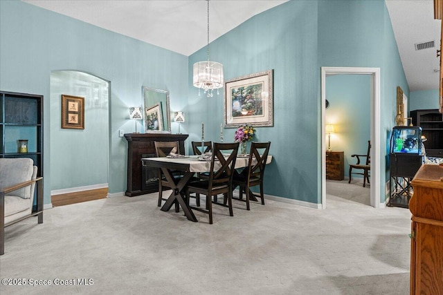 1787 Attilburgh Blvd, West Melbourne, FL 32904 - dining space with carpet, high vaulted ceiling, and a chandelier