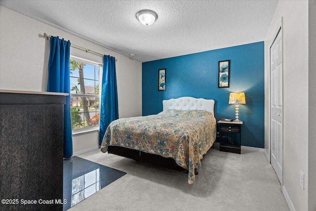 1787 Attilburgh Blvd, West Melbourne, FL 32904 - bedroom featuring a textured ceiling and carpet flooring