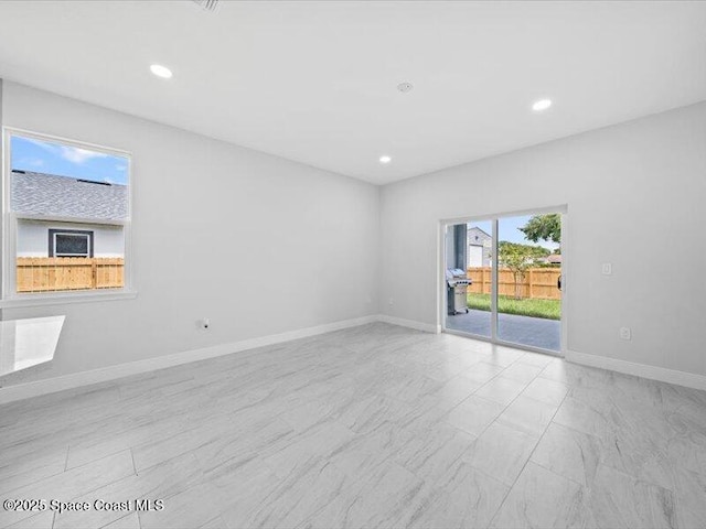3358 Nancy St, West Melbourne, FL 32904 - unfurnished room featuring baseboards and recessed lighting