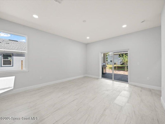 3358 Nancy St, West Melbourne, FL 32904 - spare room with plenty of natural light and recessed lighting