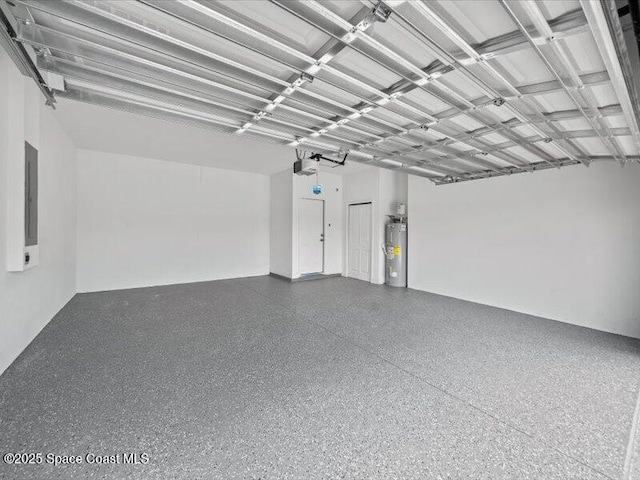 3358 Nancy St, West Melbourne, FL 32904 - garage featuring water heater, electric panel, and a garage door opener
