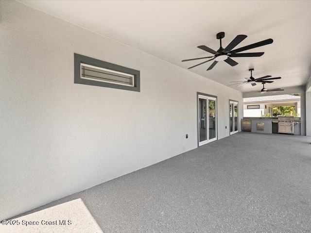 3358 Nancy St, West Melbourne, FL 32904 - view of patio / terrace with exterior kitchen and a ceiling fan