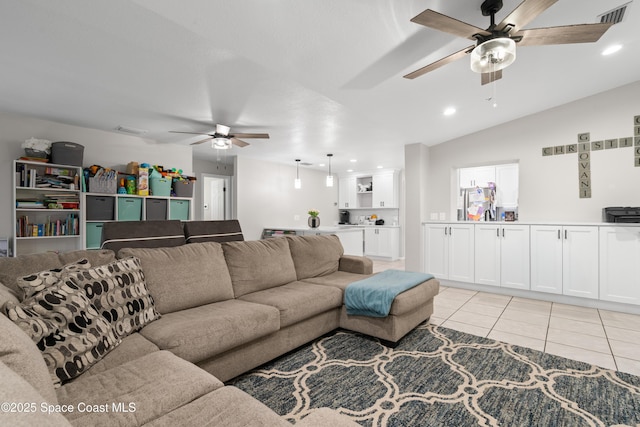 845 Westport Dr, Rockledge, FL 32955 - living room with ceiling fan, recessed lighting, and light tile patterned floors
